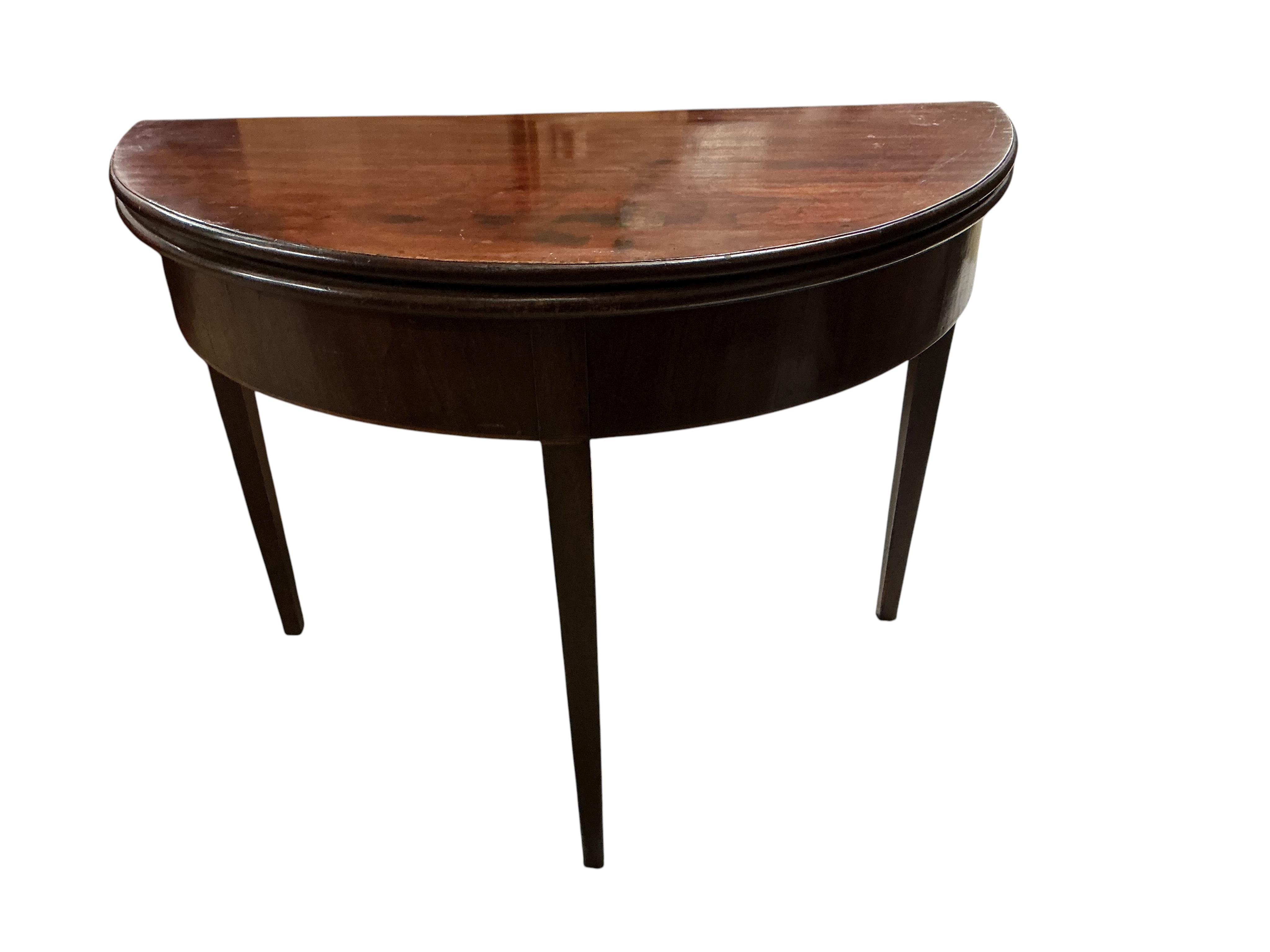 A George III mahogany demi-lune folding tea table, width 94cm, depth 46cm, height 73cm